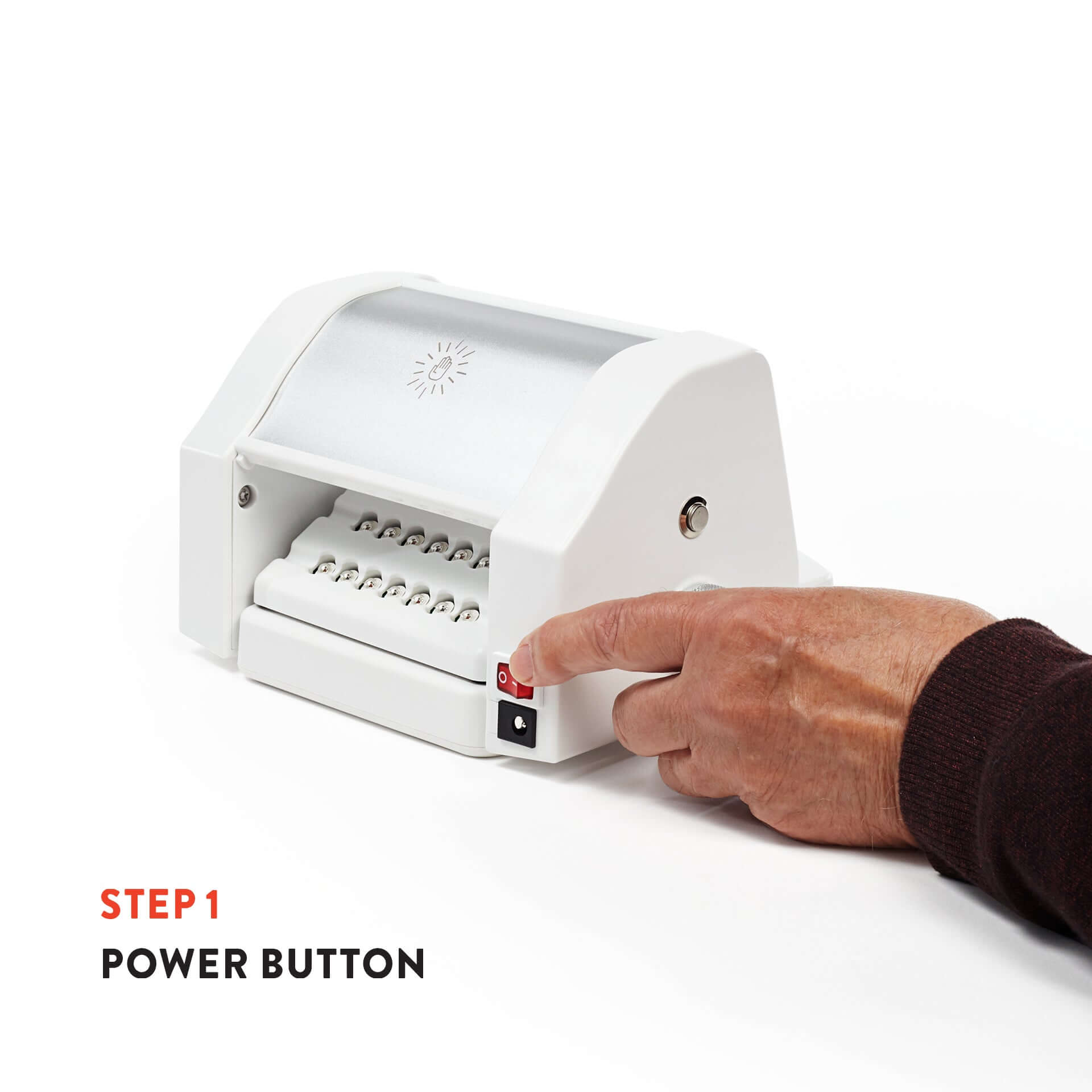 Power button on the Triumph Hand Therapy Device